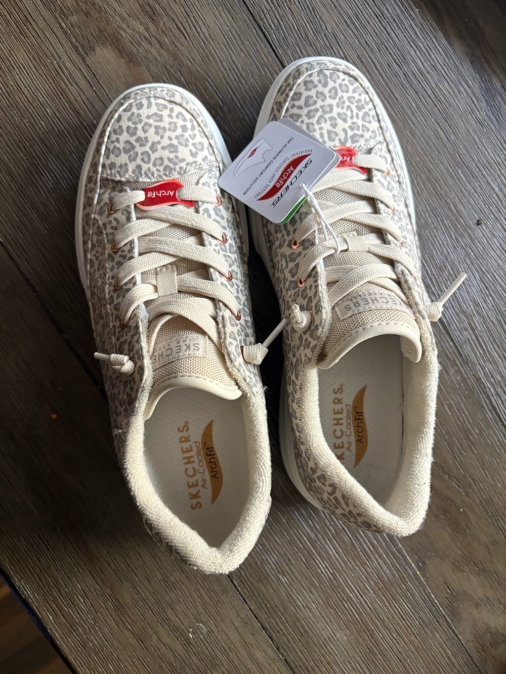 Skechers Beige Leopard Print Slip-On Sneakers